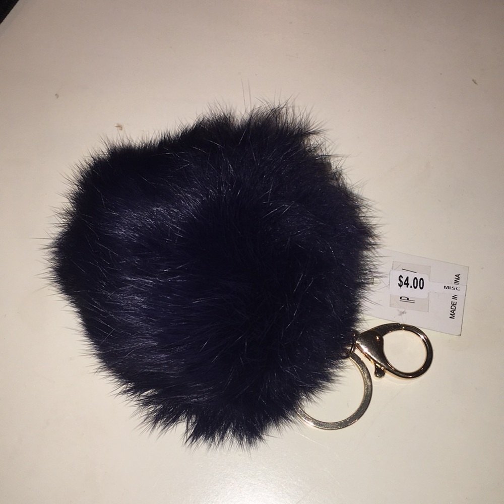 Navy blue puffball keychain